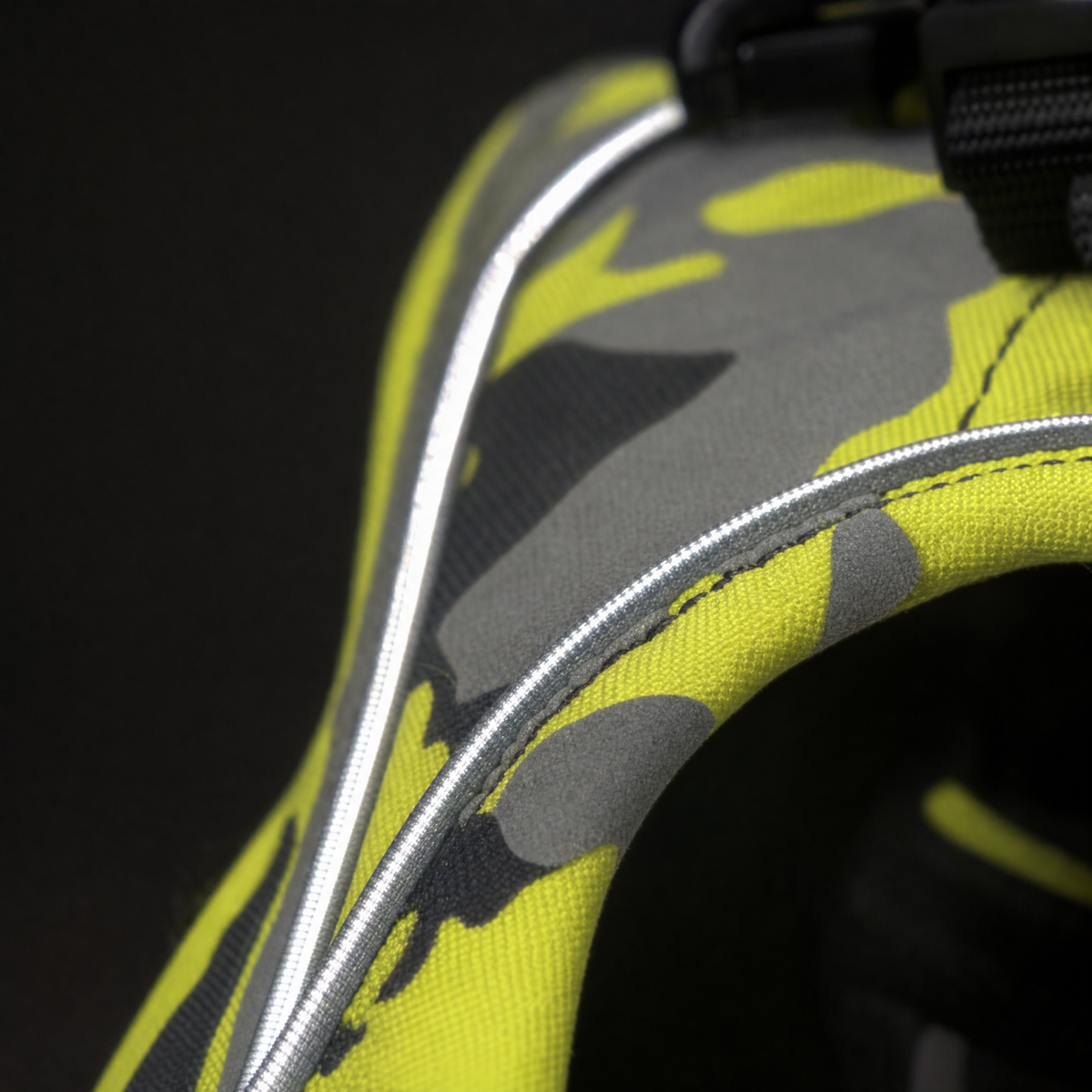 Close-up of the reflective piping catching light